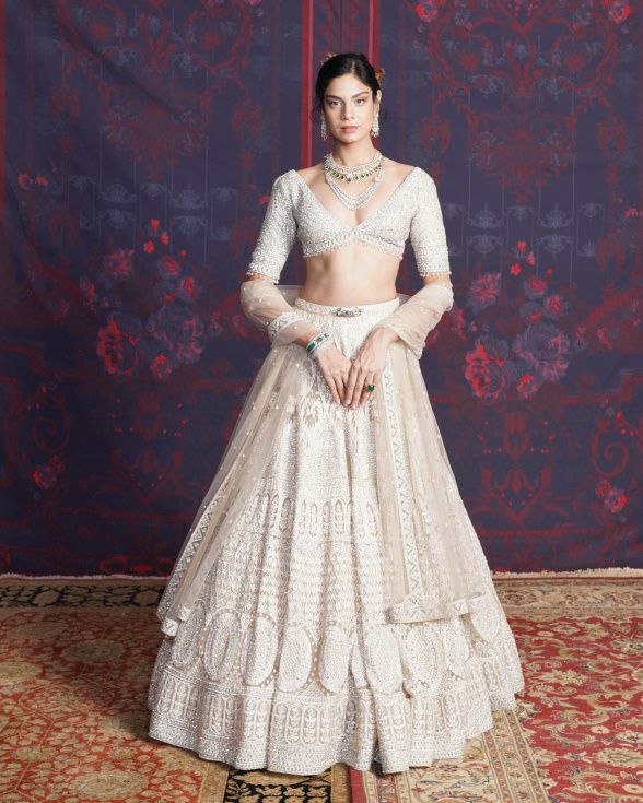 Raegen Beige-based, Ivory Lehenga Set With A V-neck Blouse