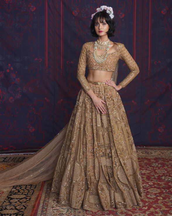 Reyna Golden Lehenga Set With A Full-sleeves Blouse And Dupatta