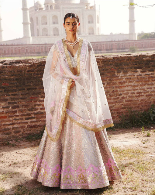 Light cream cotton silk weaved lehenga paired with fushia pink weaved  dupatta KALKI Fashion India