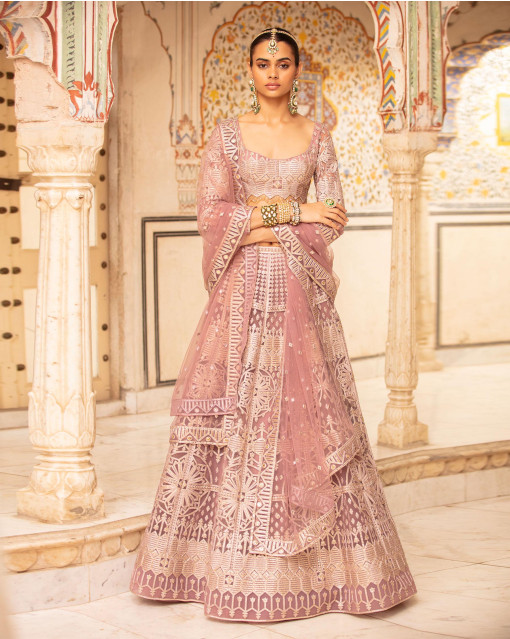 Day Wedding Lehenga Style | Chitrangada Singh | Dull yellow gold and light pink  Lehenga with allover embroidery, pink net dupatta | Tarun Tahiliani |  Curated by Witty Vows - Witty Vows