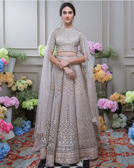 BABY PINK LEHENGA SET WITH SHADE COLOURED EMBROIDERY, SEQUIN DETAILS AND  CONTRAST STEEL GREY LINING PAIRED WITH A MATCHING DUPATTA AND SILVER  TASSELS. - Seasons India