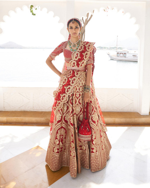 Classy Onion Red colored Heavy Embroidered Bridal Lehenga Set - Rent