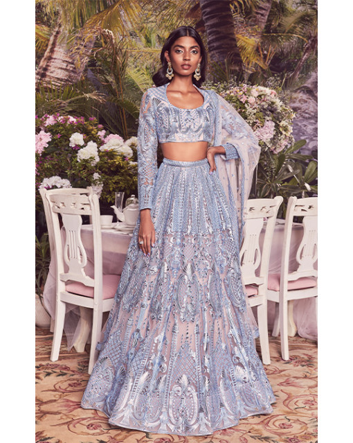 Photo of Engagement look with light blue lehenga and chunky silver jewellery