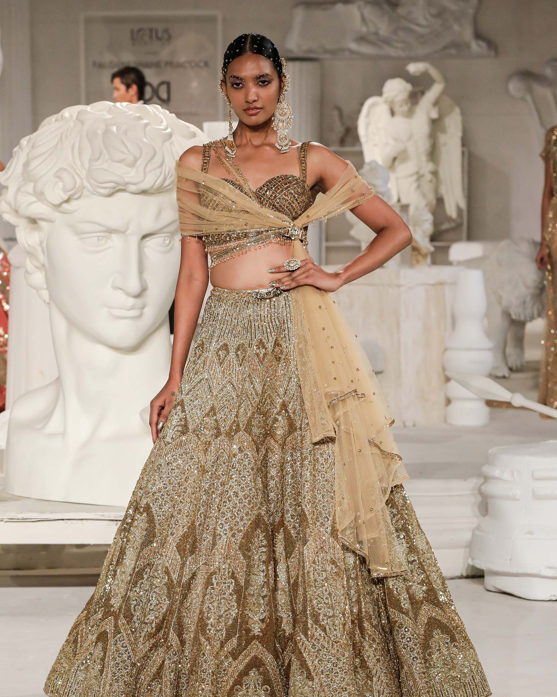 Gold Net Pearl Embroidered Lehenga Set Design by Seema Gujral at Pernia's  Pop Up Shop 2024