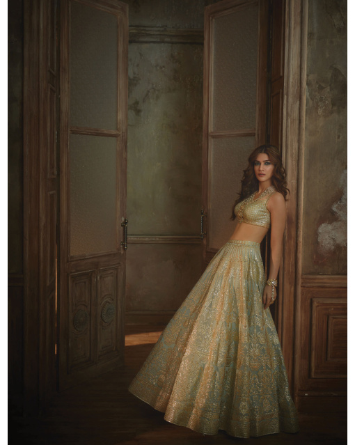 Kriti Sanon Powder blue-based, golden chrome applique Lehenga