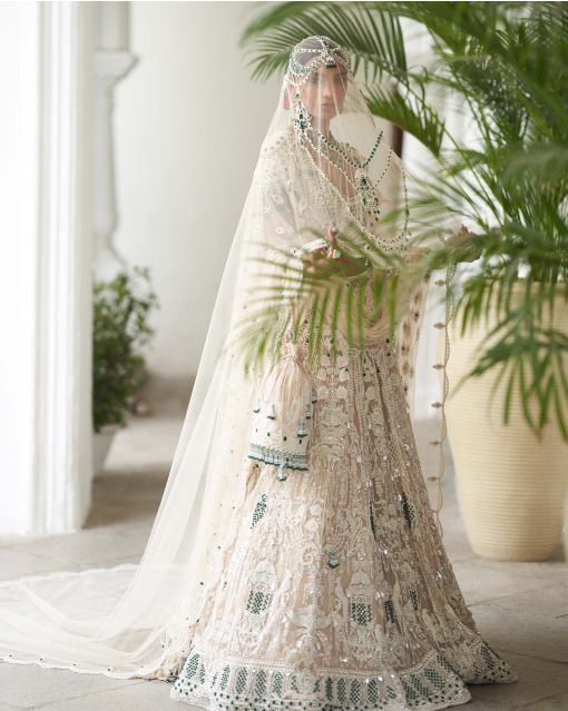 Avice Light Beige-Based, Ivory And Emerald Lehenga Set With Emerald Stones