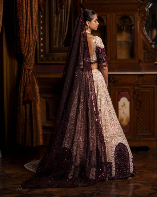 Alida Faded Rose Pink-Based, Ivory, Golden And Maroon Lehenga Set