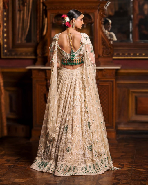 Avice Light Beige-Based, Ivory And Emerald Lehenga Set With Emerald Stones
