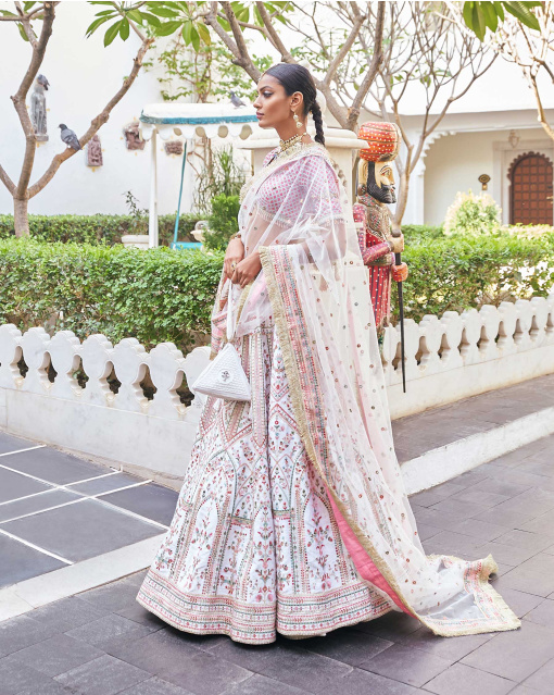 Eeksha Off-White Raw Silk Lehenga Set Embroidered With Tassel Details