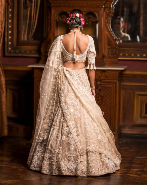 Evelyn Faded Beige-Based Ivory Lehenga Set With Ivory Threadwork