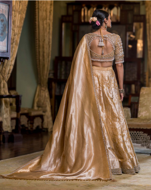 Zelie Golden Silk Lehenga Set With Elephant & Swan Motifs