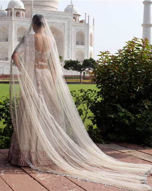 Angelline Ivory Lehenga Set Handcrafted With Sequins