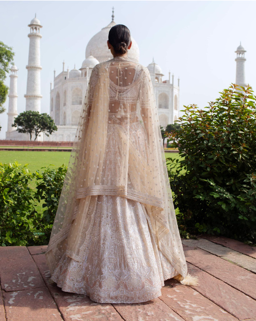 Leah Light Peach Lehenga Set Handcrafted With Metal Threadwork