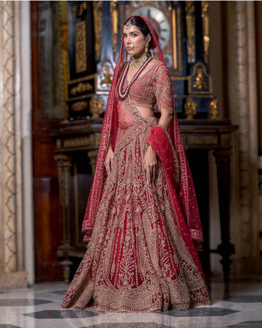 Corsica Fiery Red Lehenga Set With Intricate Golden Threadwork Details