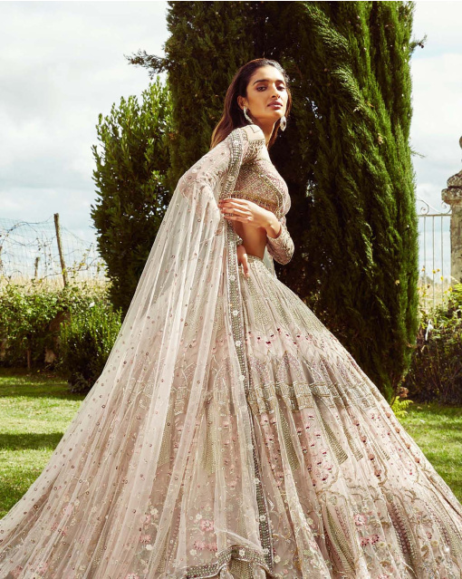 Mauve-hued, foliage embroidered lehenga, styled