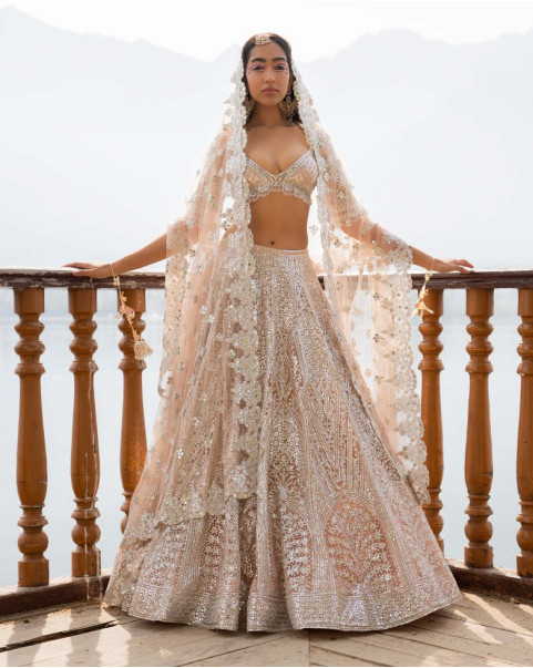 New and Unique Turquoise Wedding Lehenga Choli with Intricate  Embellishments.