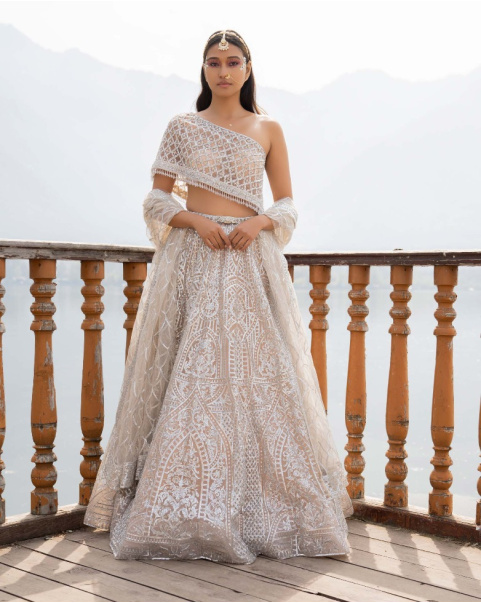 Amaari Light Peach Lehenga Set With Architectural Motifs