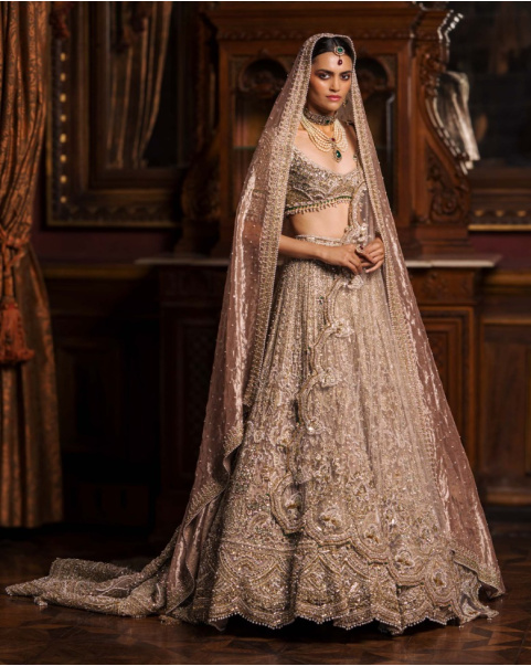 Alexandrine Faded Powder Pink-Based Lehenga Set With Pearl Tassel Detailing