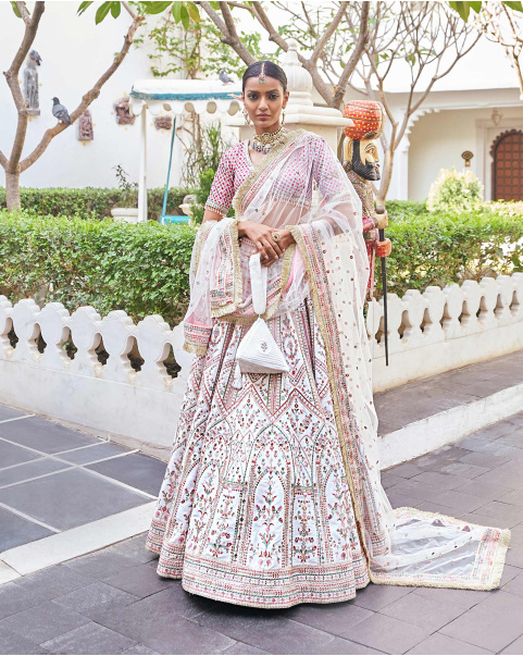 Eeksha Off-White Raw Silk Lehenga Set Embroidered With Tassel Details