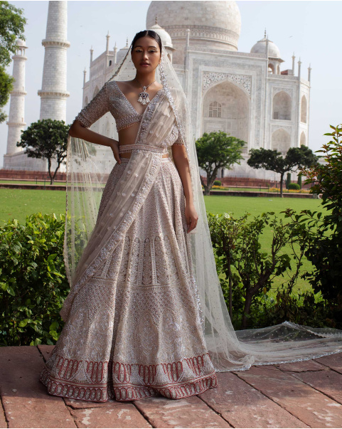 Angelline Ivory Lehenga Set Handcrafted With Sequins