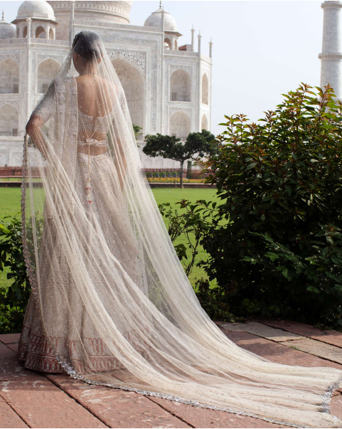 Angelline Ivory Lehenga Set Handcrafted With Sequins