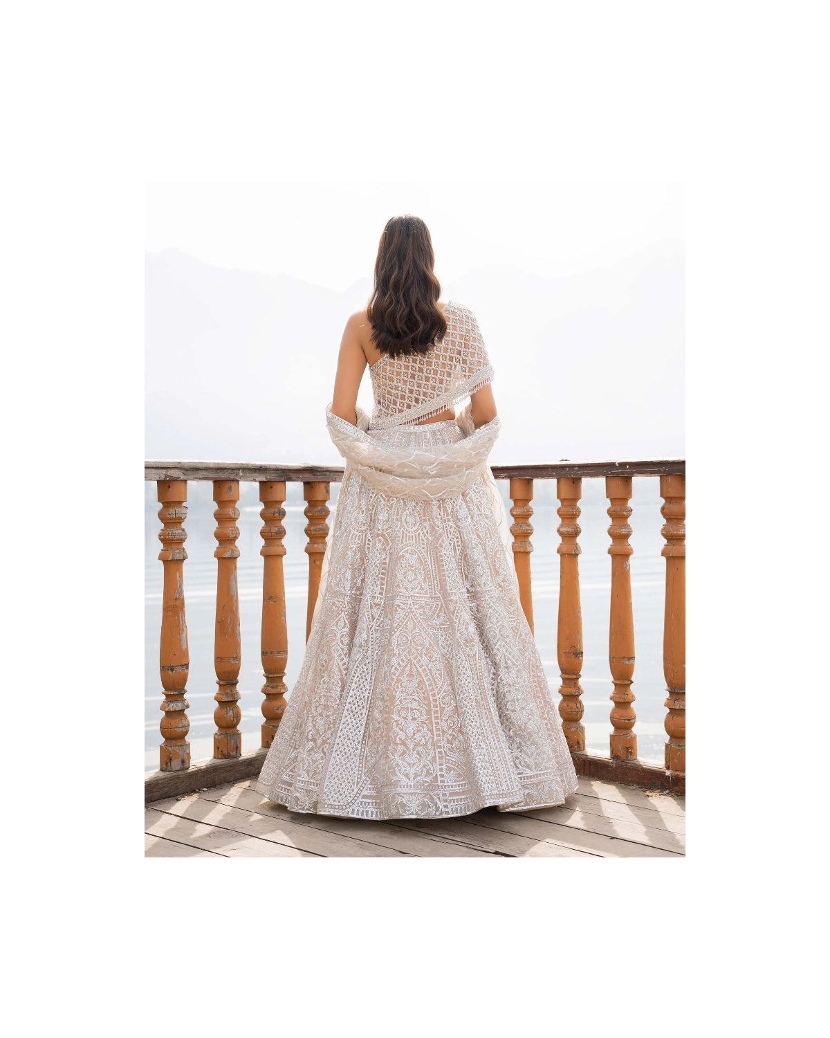 Amaari Light Peach Lehenga Set With Architectural Motifs
