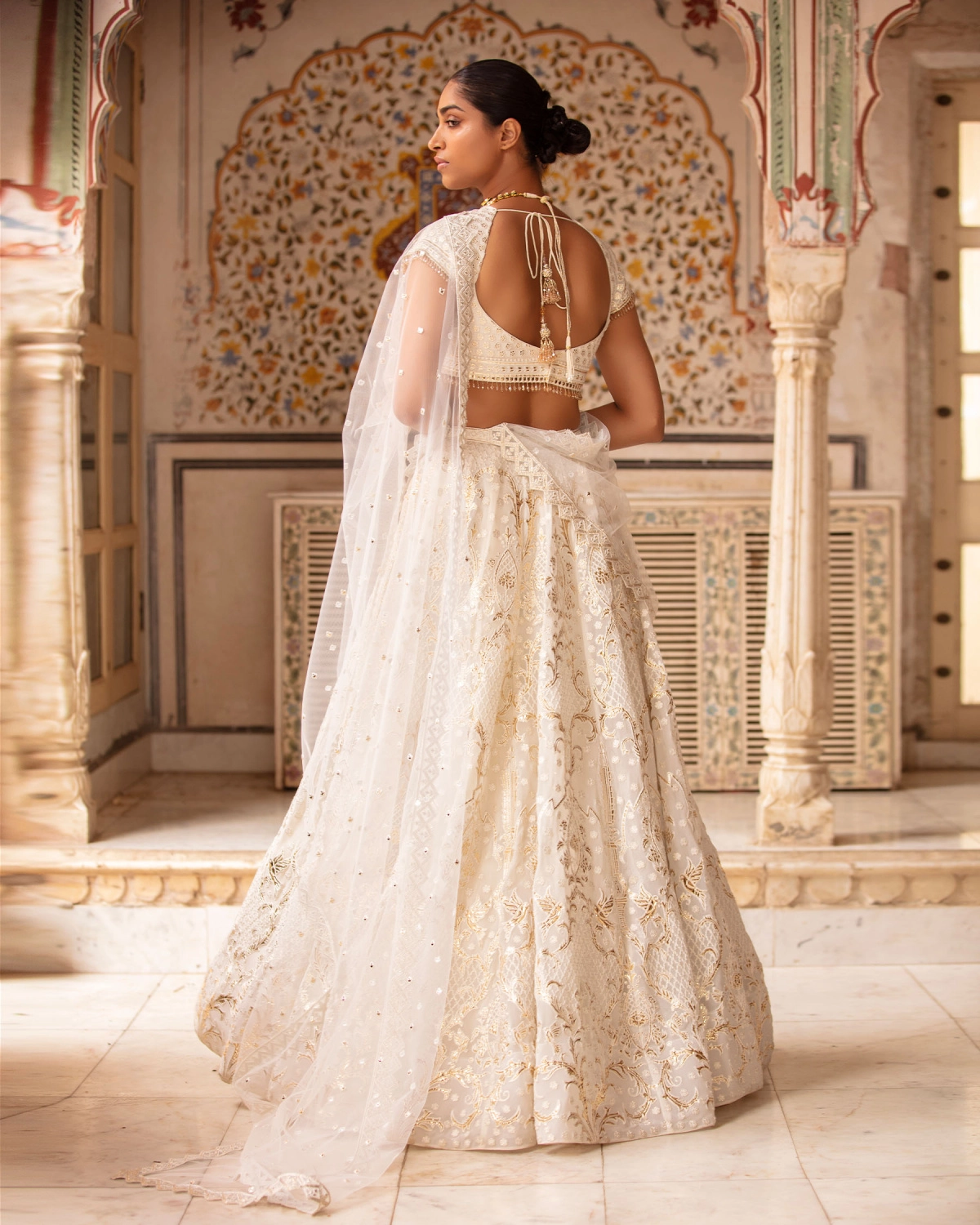 Genevieve Light Peach-based, Light Gold Lehenga Set With Tulle Dupatta