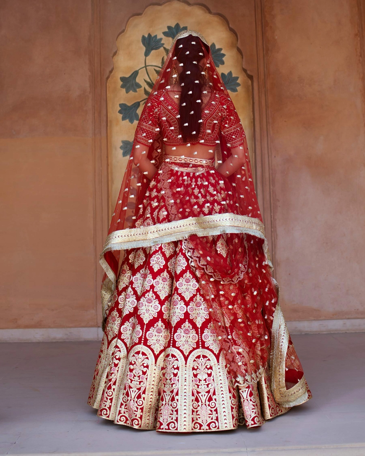 Justyne Red Chrome Applique Lehenga Set Teamed With A Handcrafted Blouse