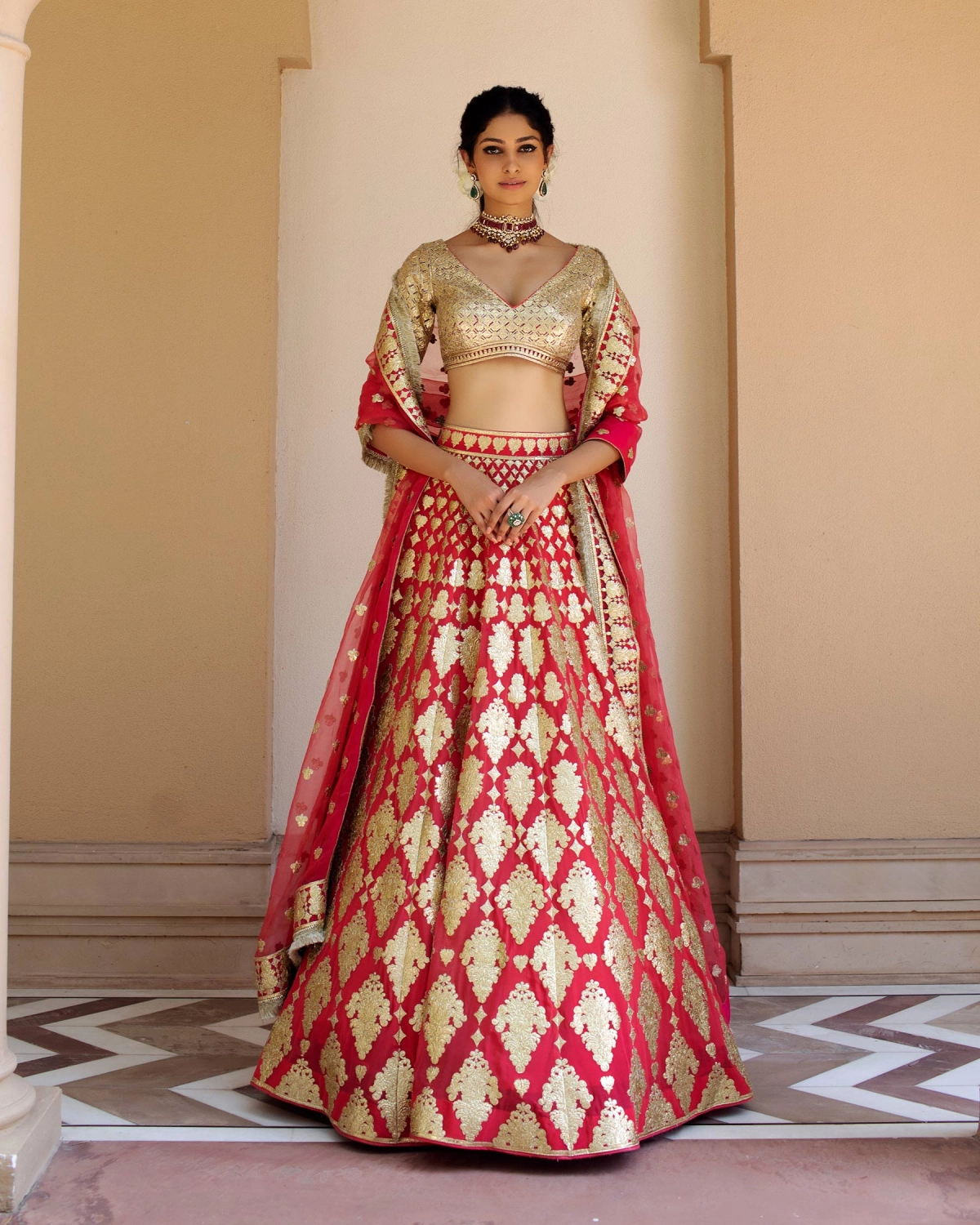 Muriel Coral Red Lehenga Set With Golden Chrome Applique Details