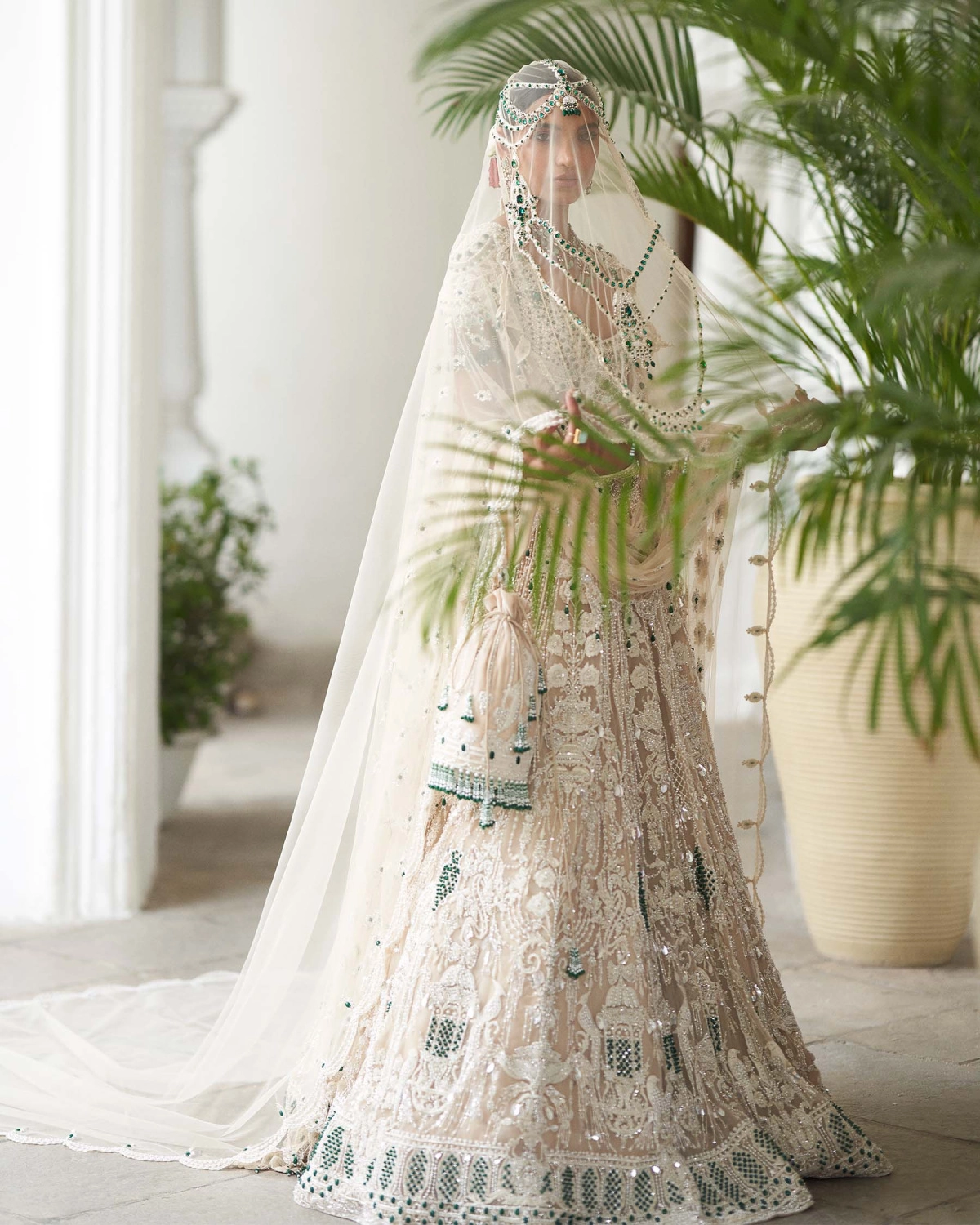 Avice Light Beige-based, Ivory And Emerald Lehenga Set With Emerald Stones