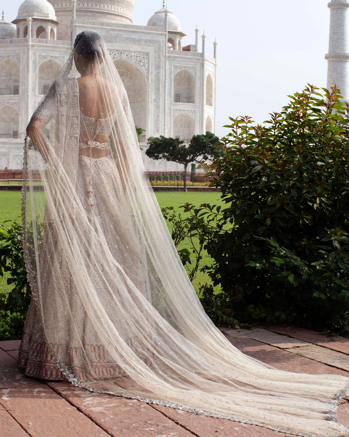 Angelline Ivory Lehenga Set Handcrafted With Sequins