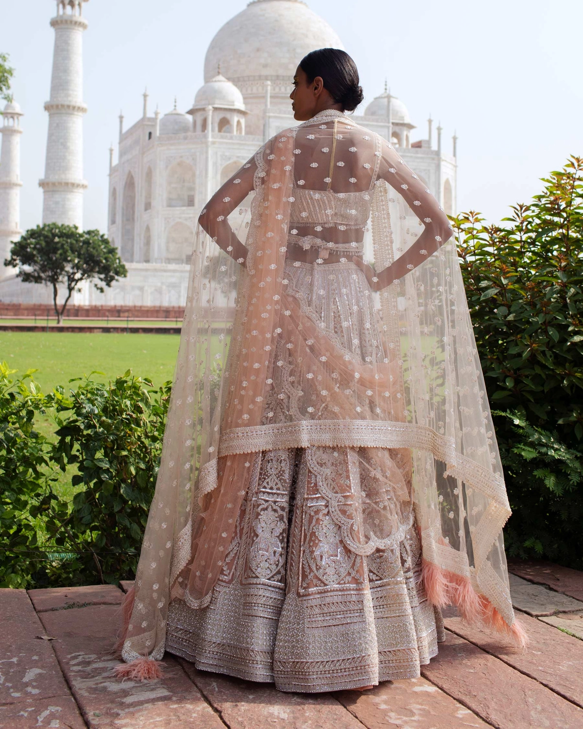 Kenza Peach Lehenga Set Handcrafted With Metal Threadwork
