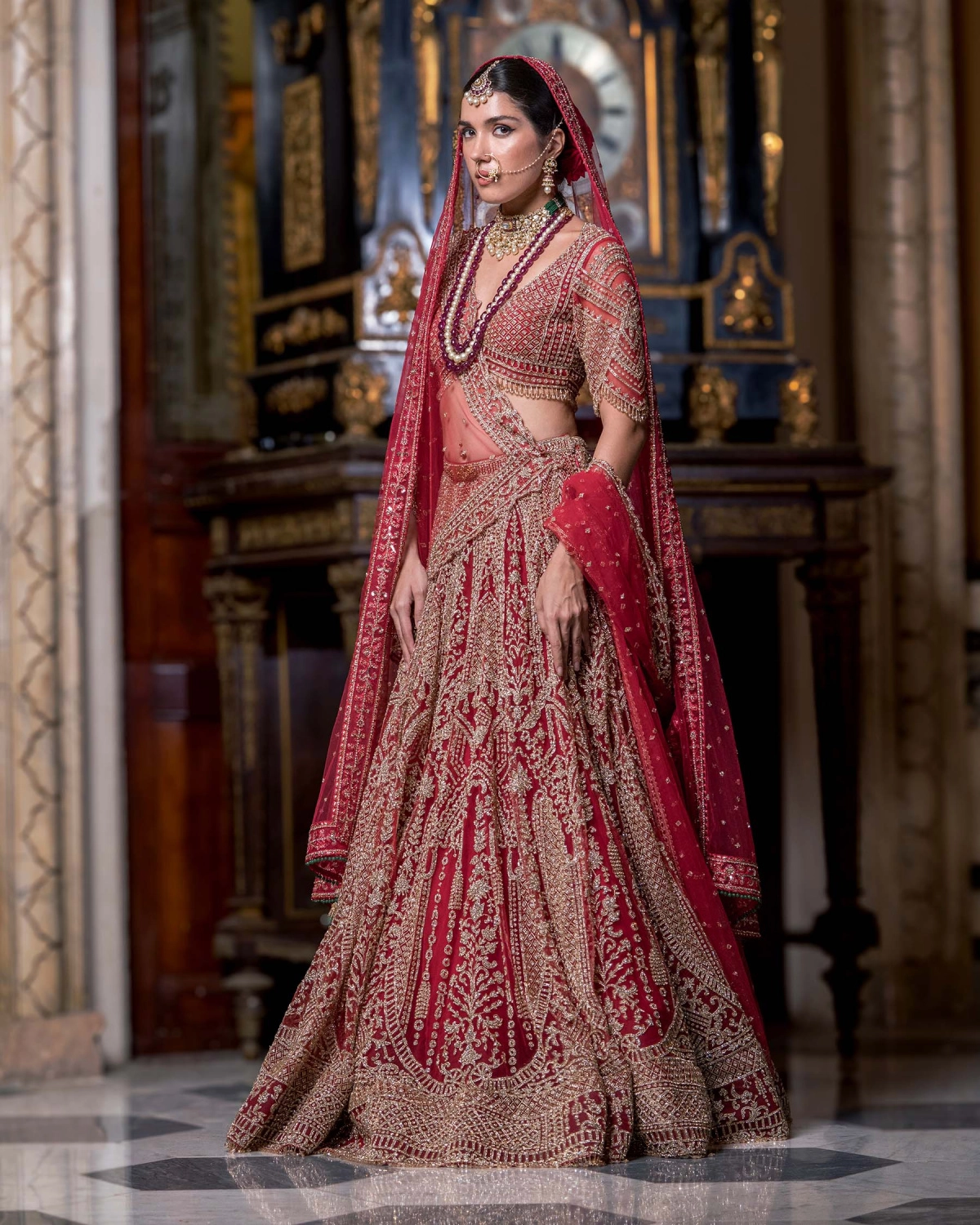 Corsica Fiery Red Lehenga Set With Intricate Golden Threadwork Details